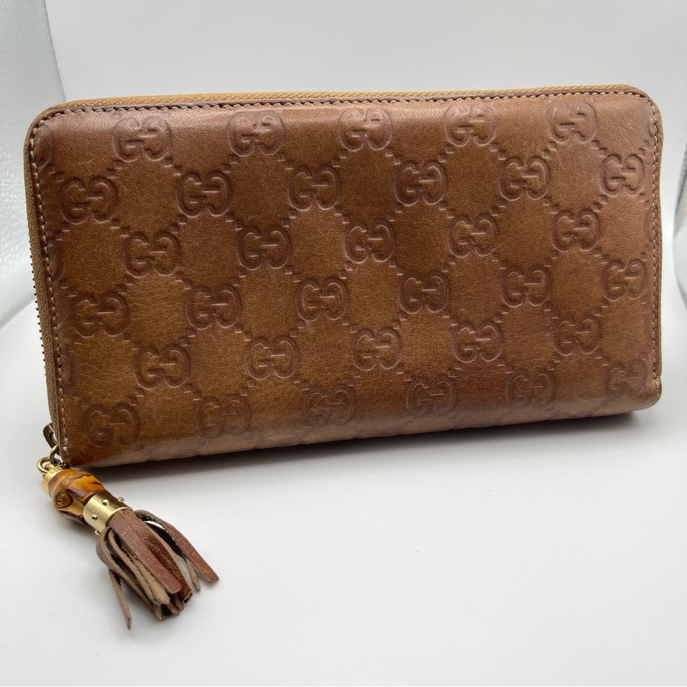 This Gucci Brown Guccissima Leather Long Zippy Organizer Wallet 308281•0959